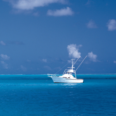 a yacht on blue ocean waters
